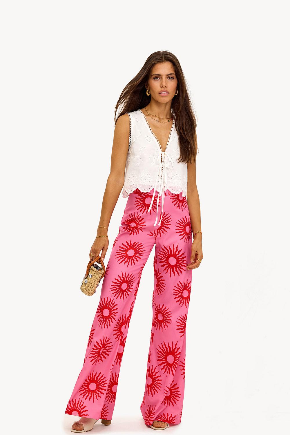 Pantalón rosa con estampado tropical