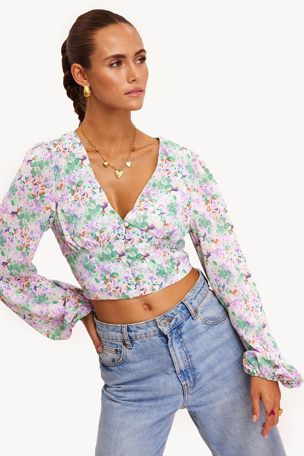 Blusa verde oscuro con estampado floral