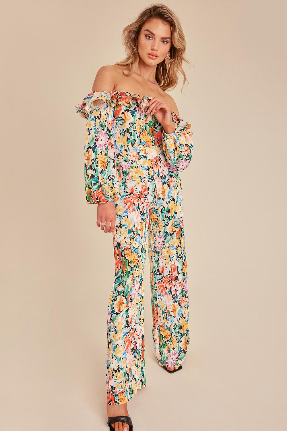 Yellow jumpsuit with floral print