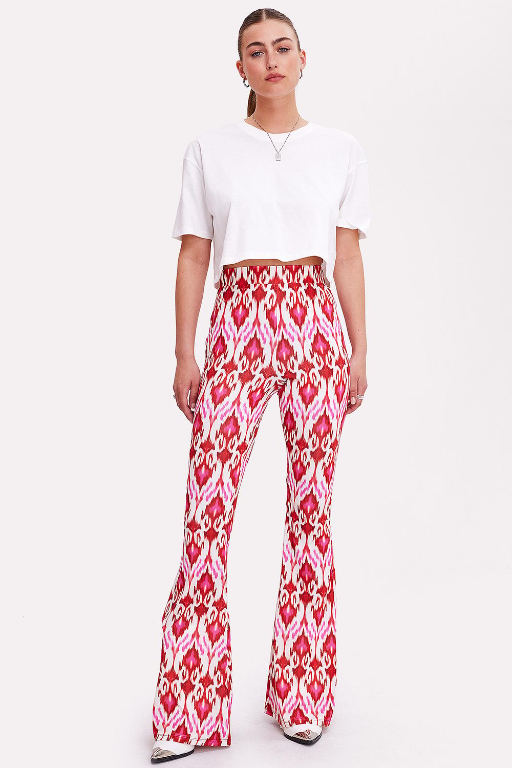 Pink flared trousers with aztec print