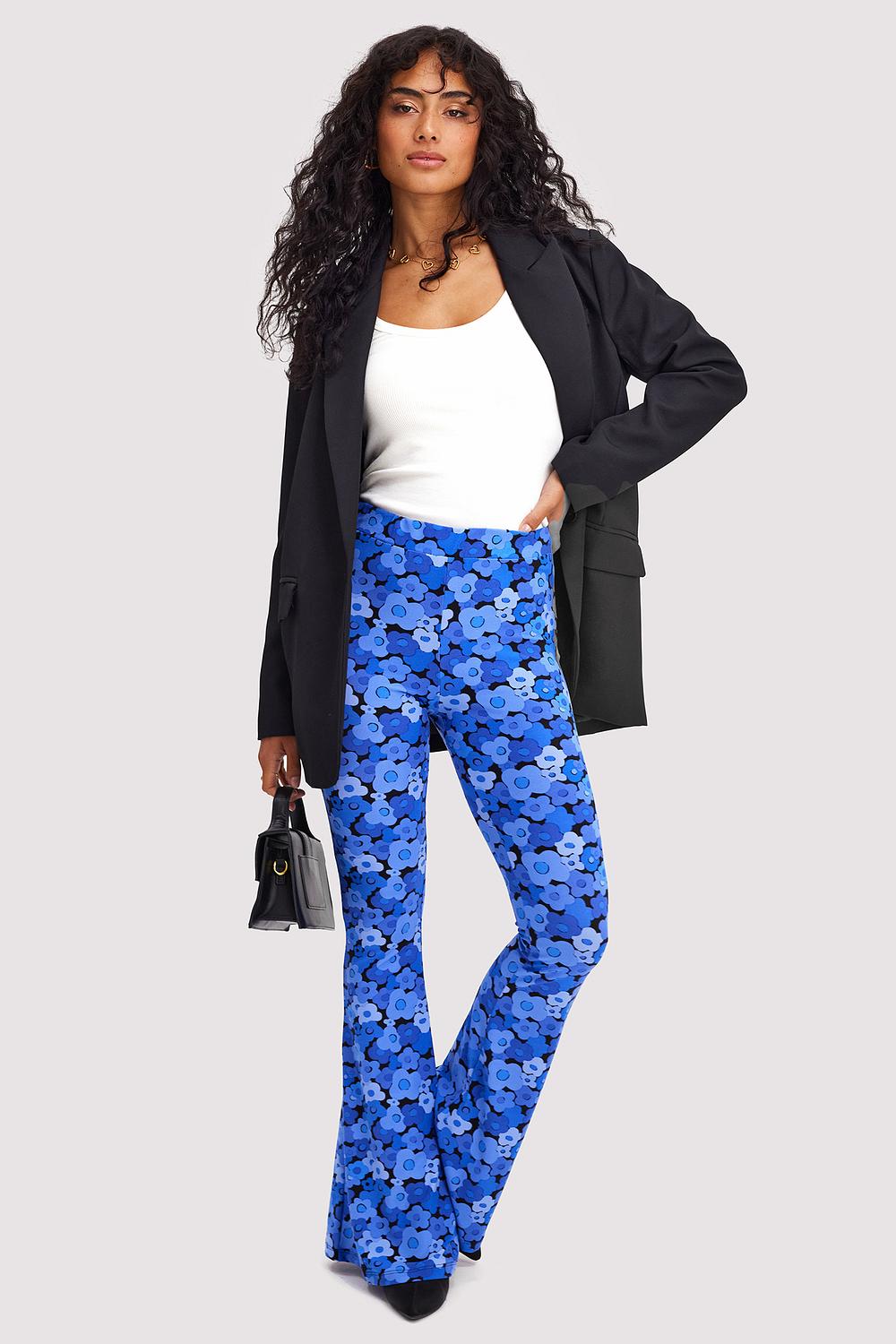 Blue flared trousers with floral print