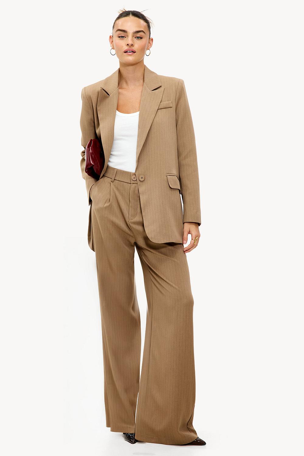 Camel-colored pants with stripes