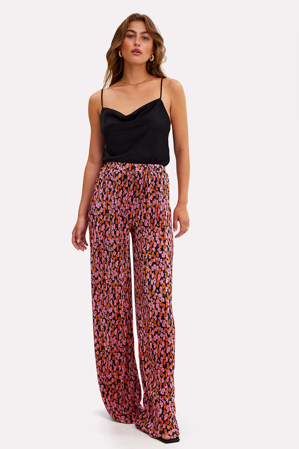Pink trousers with floral print