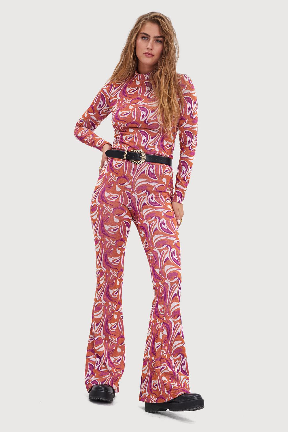Orange flared trousers with graphic print