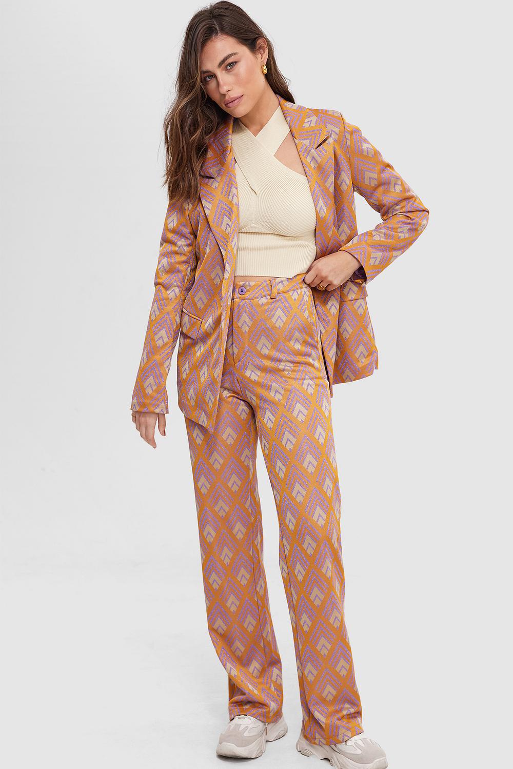 Golden trousers with graphic print