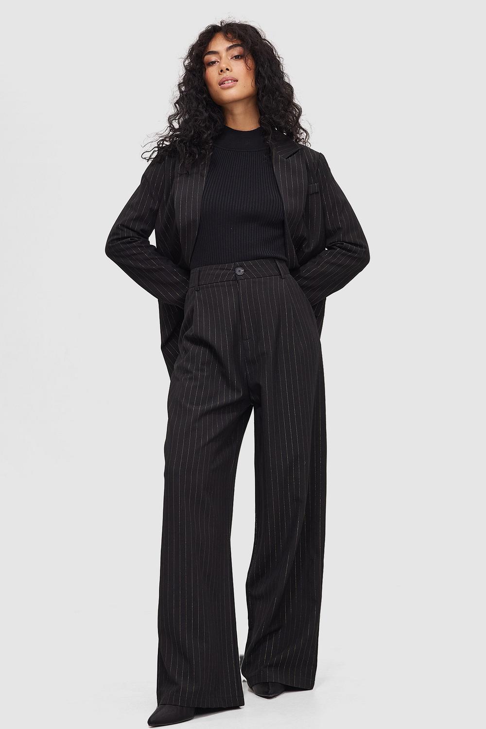 Black trousers with stripes