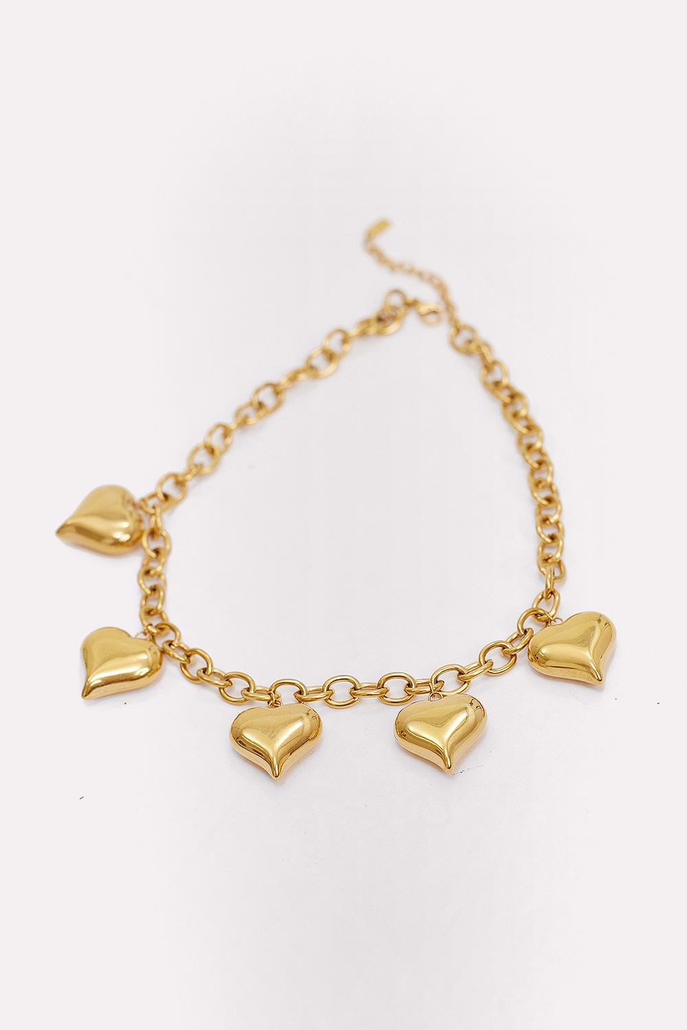 Golden necklace with hearts
