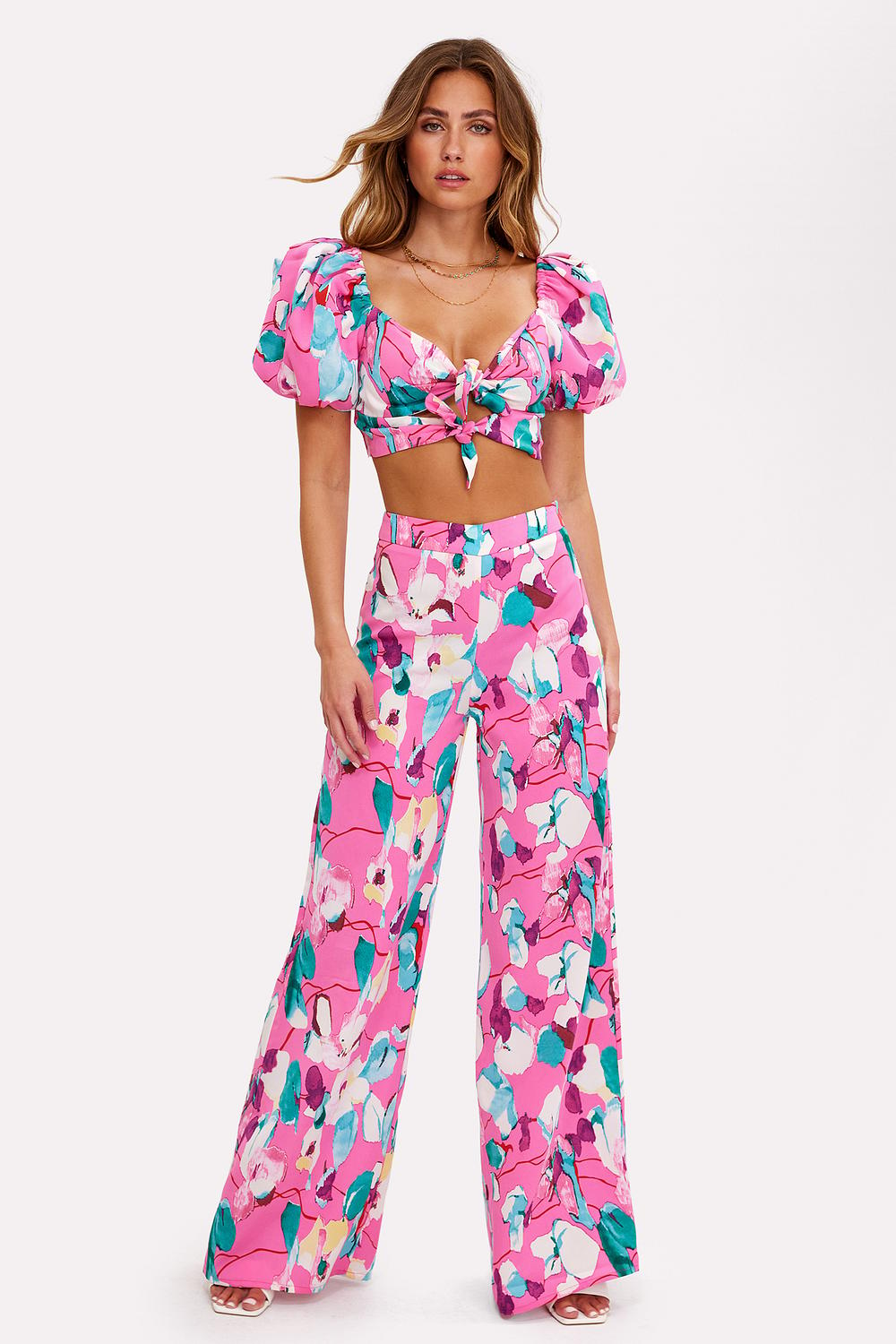 Pink trousers with floral print