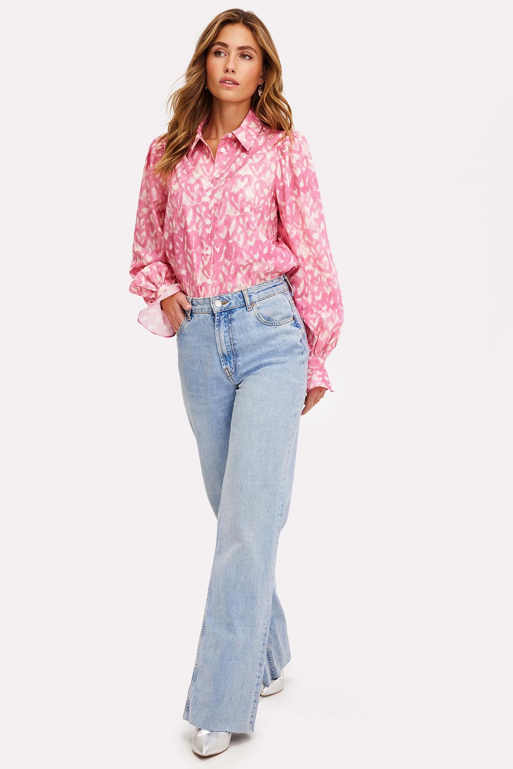The PERFECT blouse just hit the floor!! We are LOVING the light