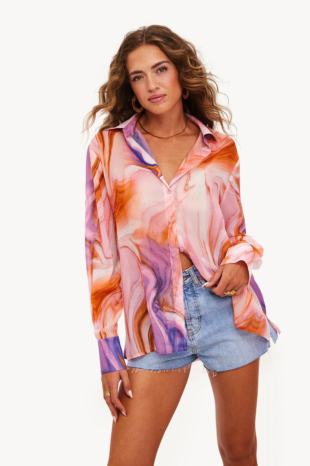 Pink blouse with swirl print