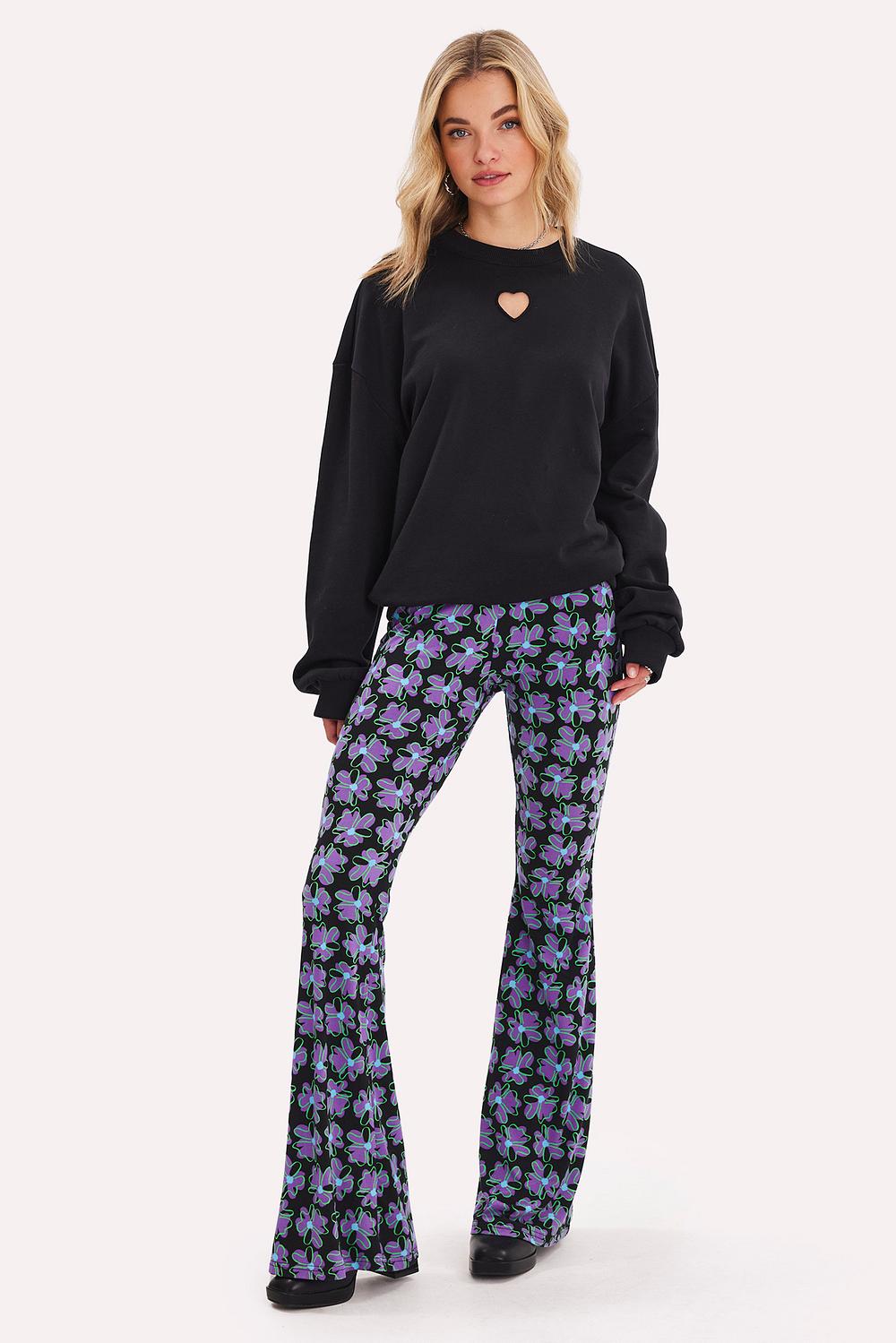 Purple flared trousers with floral print
