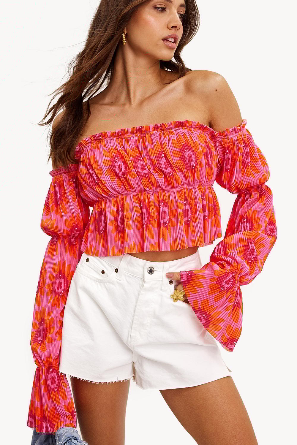 Top corto rosa con estampado floral
