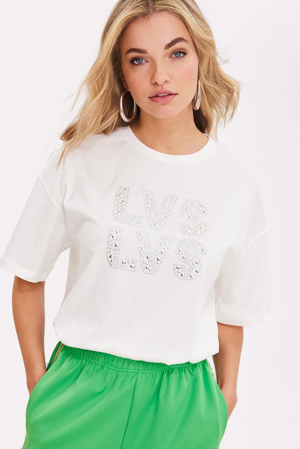T-shirt blanc au style affirmé avec clous