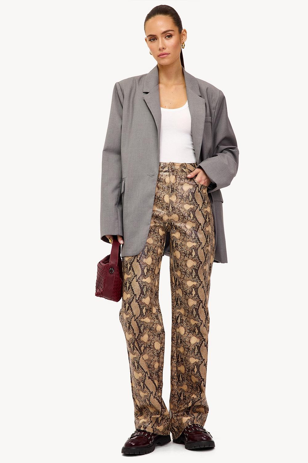 Pantalon avec imprimé serpent