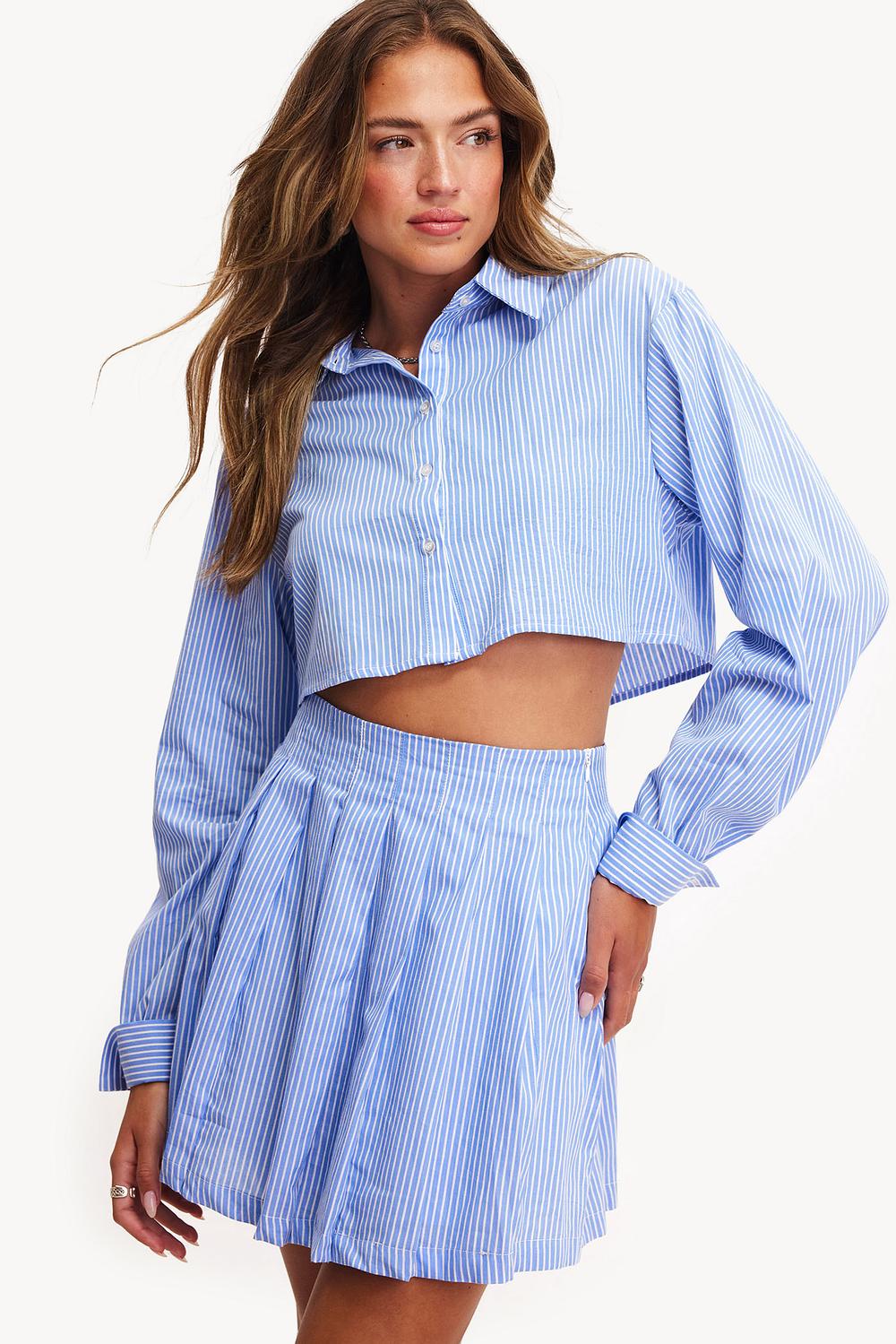 Blue blouse with stripes