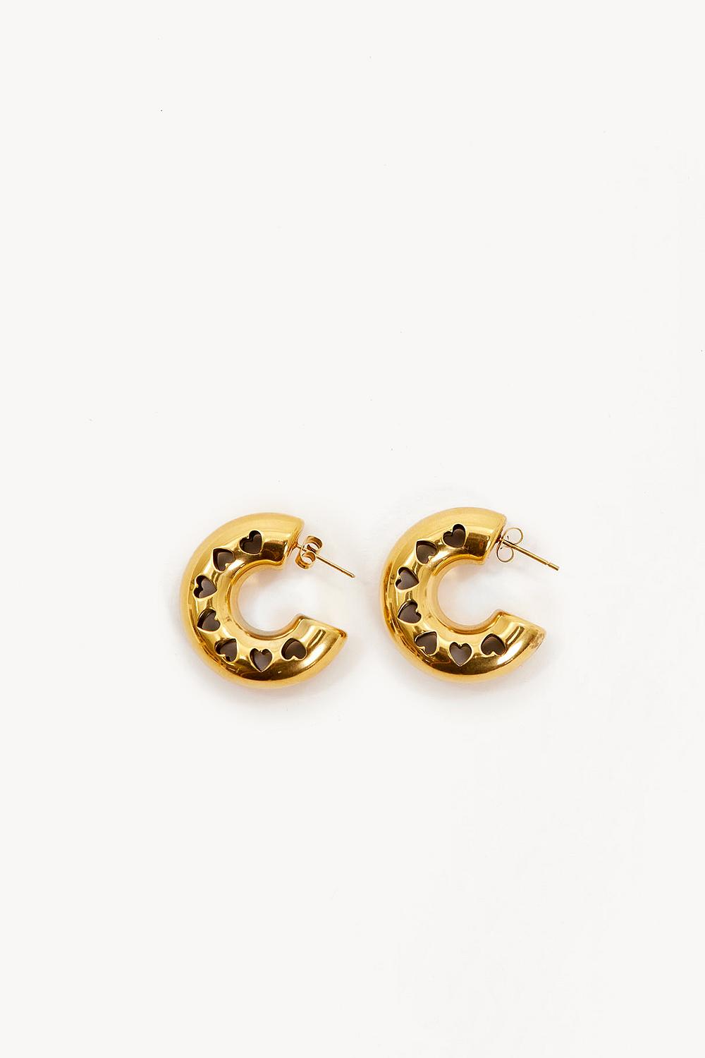 Golden hoop earrings with heart motif
