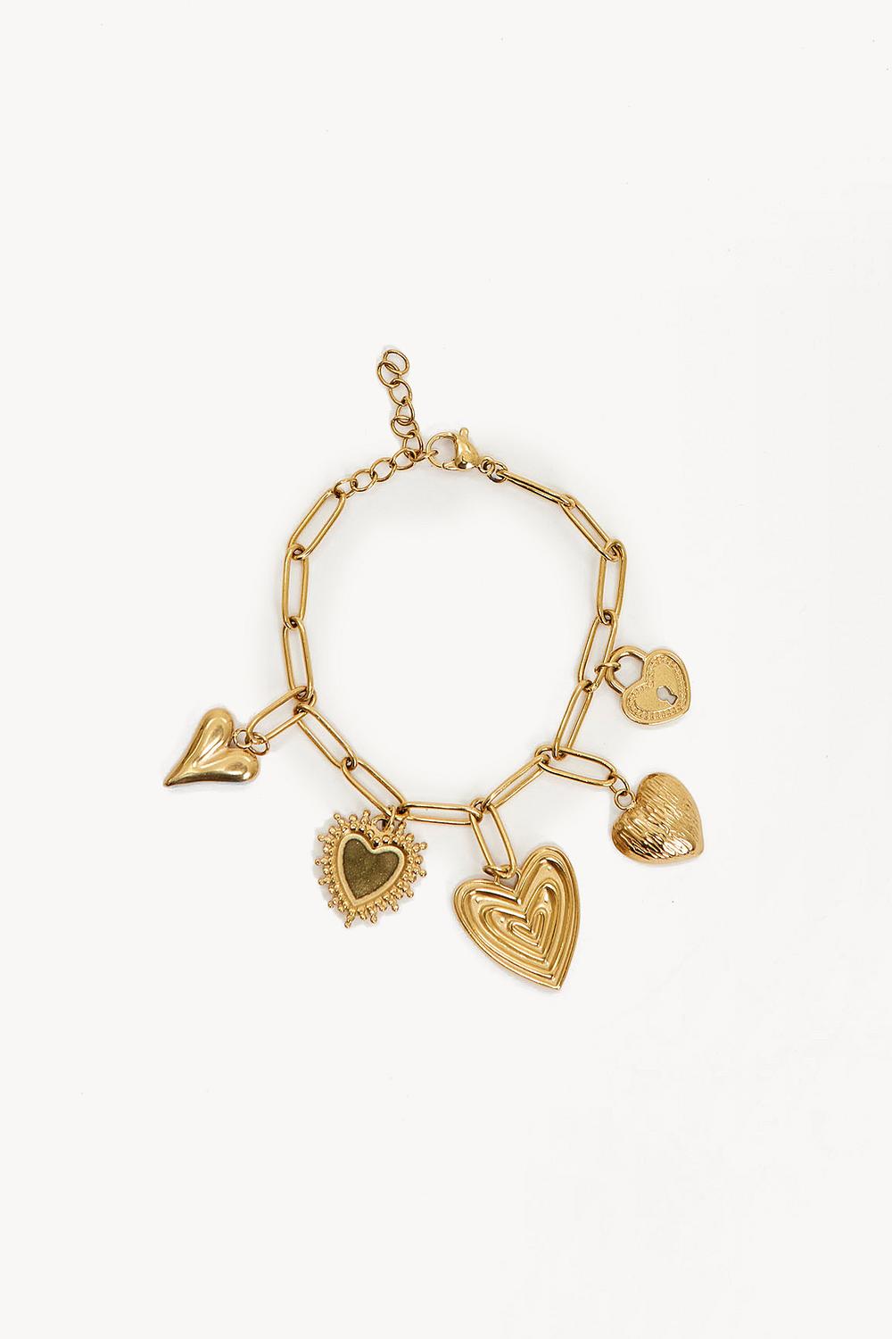 Golden bracelet with charms
