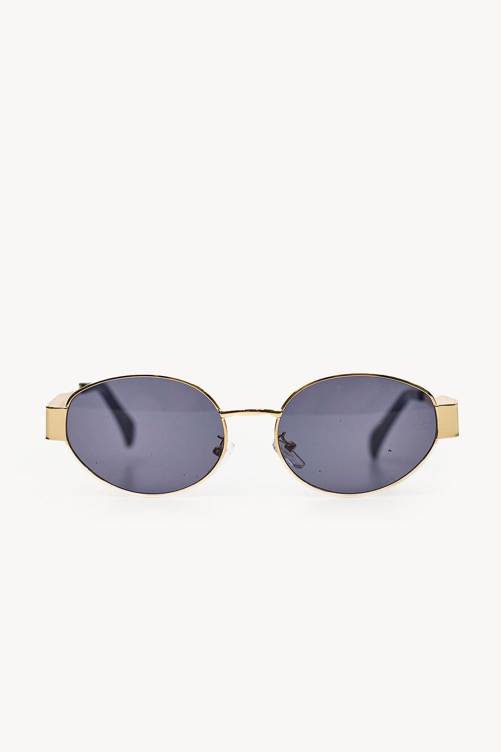 Lunettes de soleil dorées