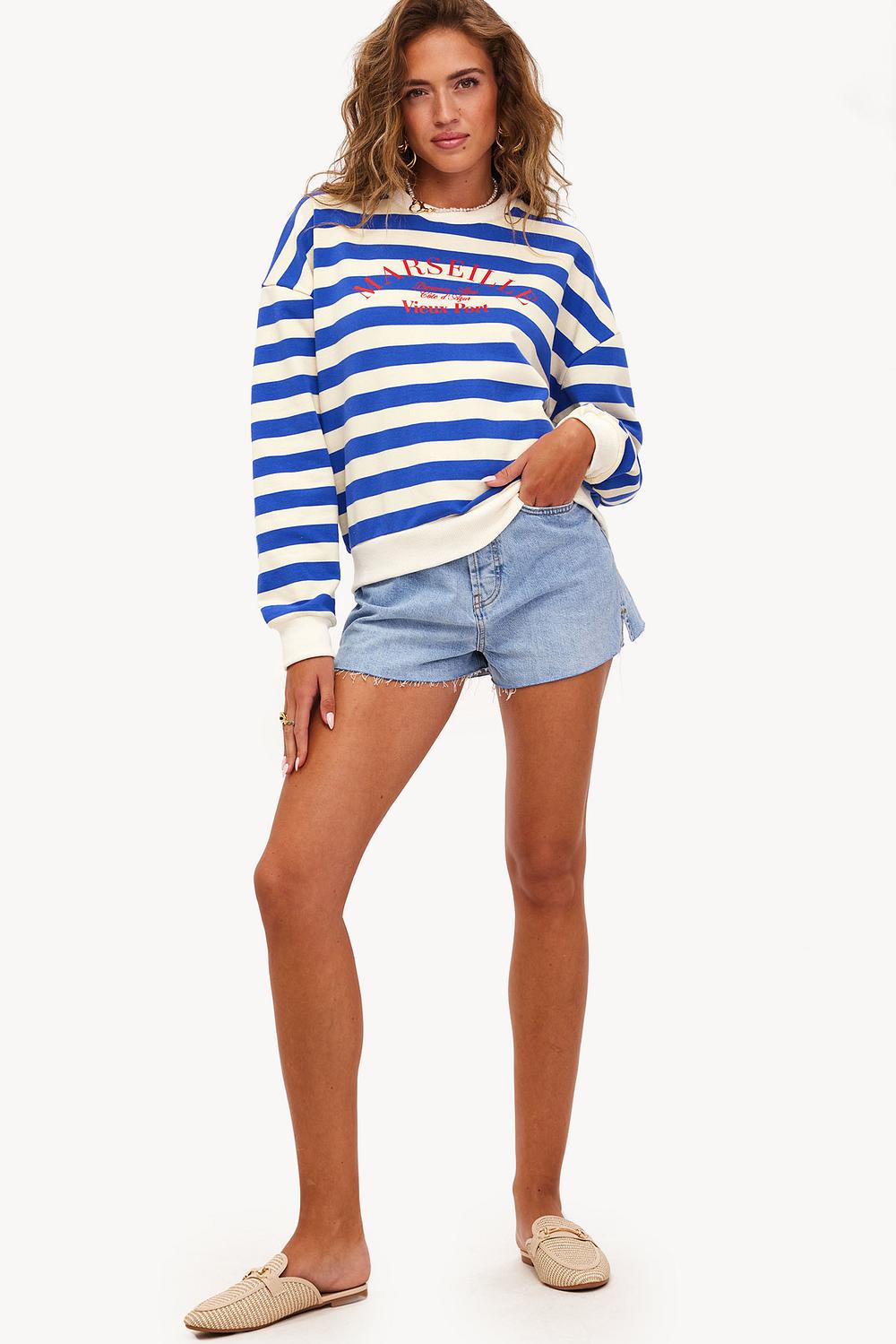 Blue sweater with stripes