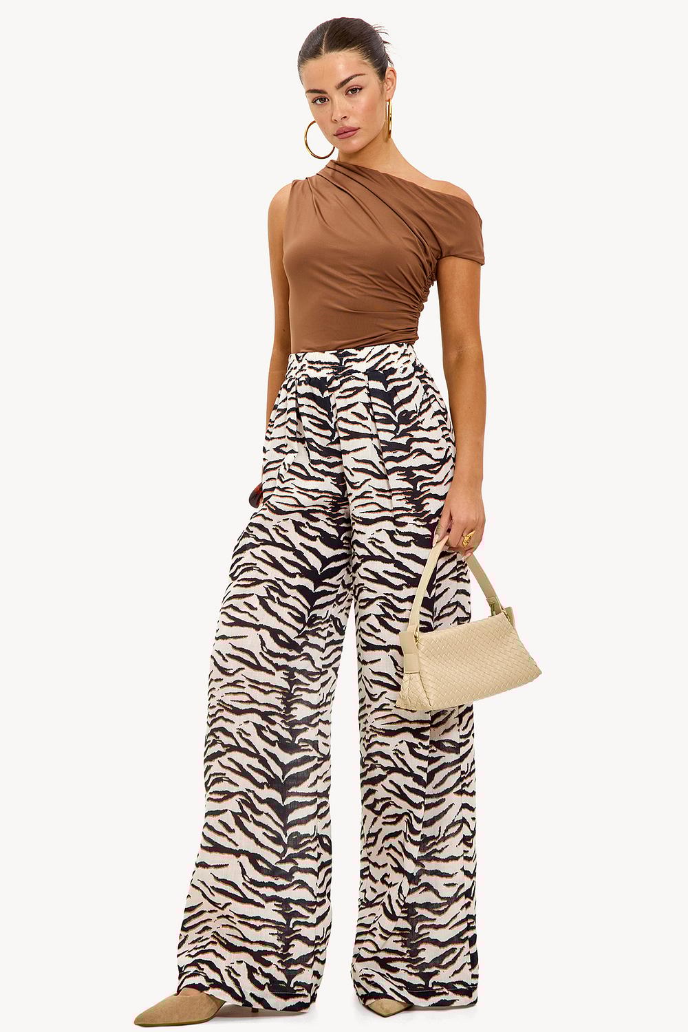 Pantalon marron à imprimé vache