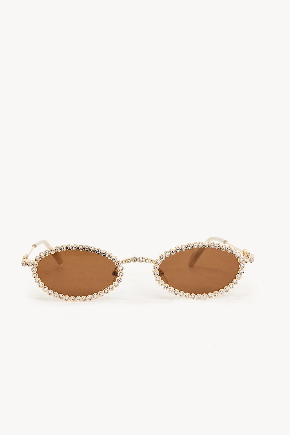 Golden sunglasses with rhinestones