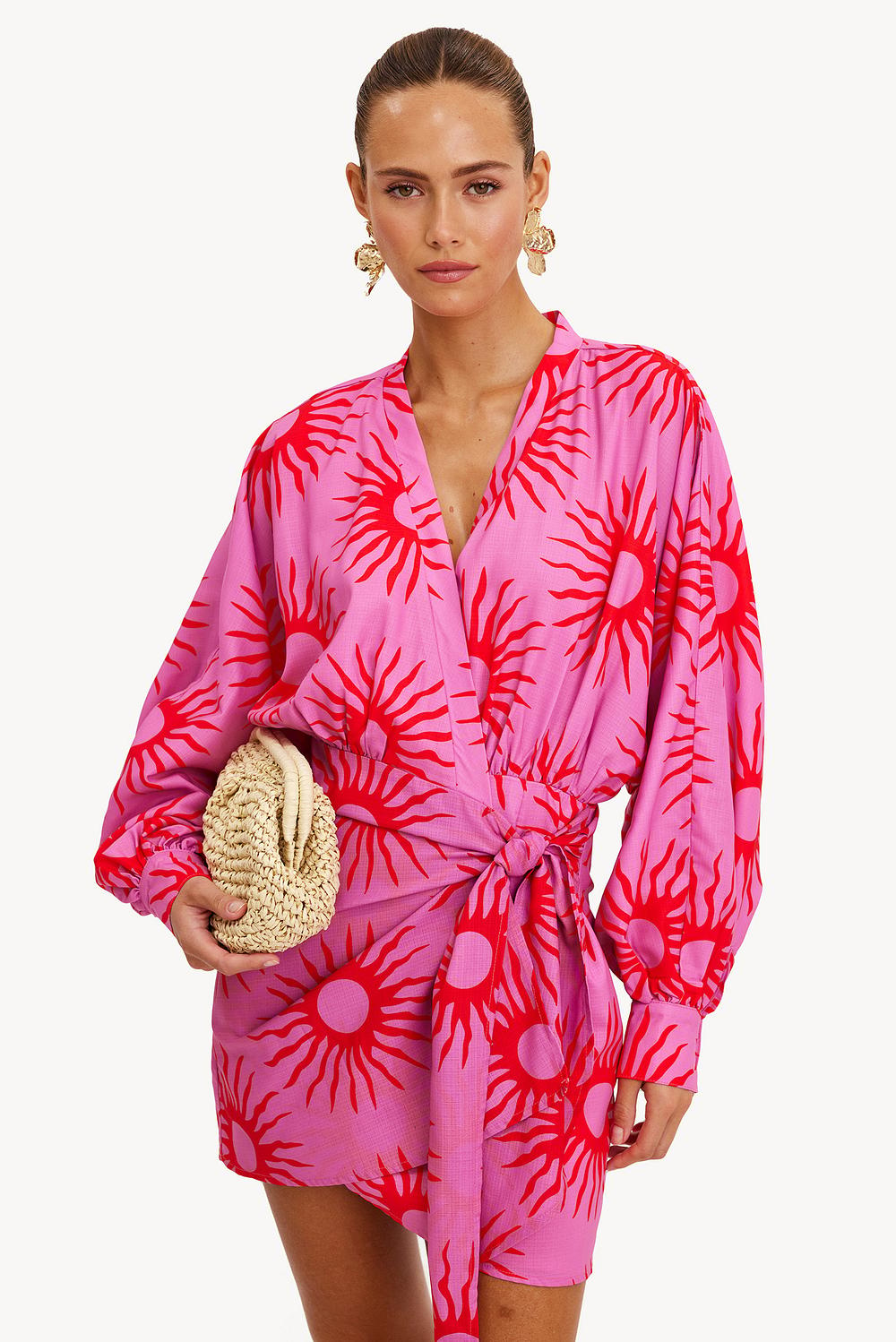 Pink wrap dress with tropical print