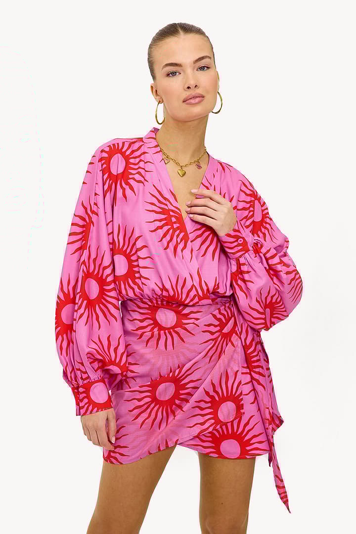 Pink wrap dress with tropical print
