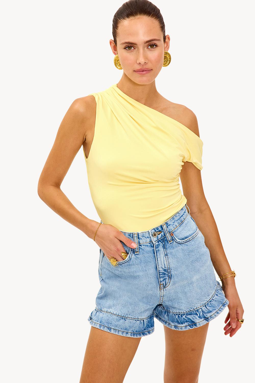 Blue denim shorts with ruffles