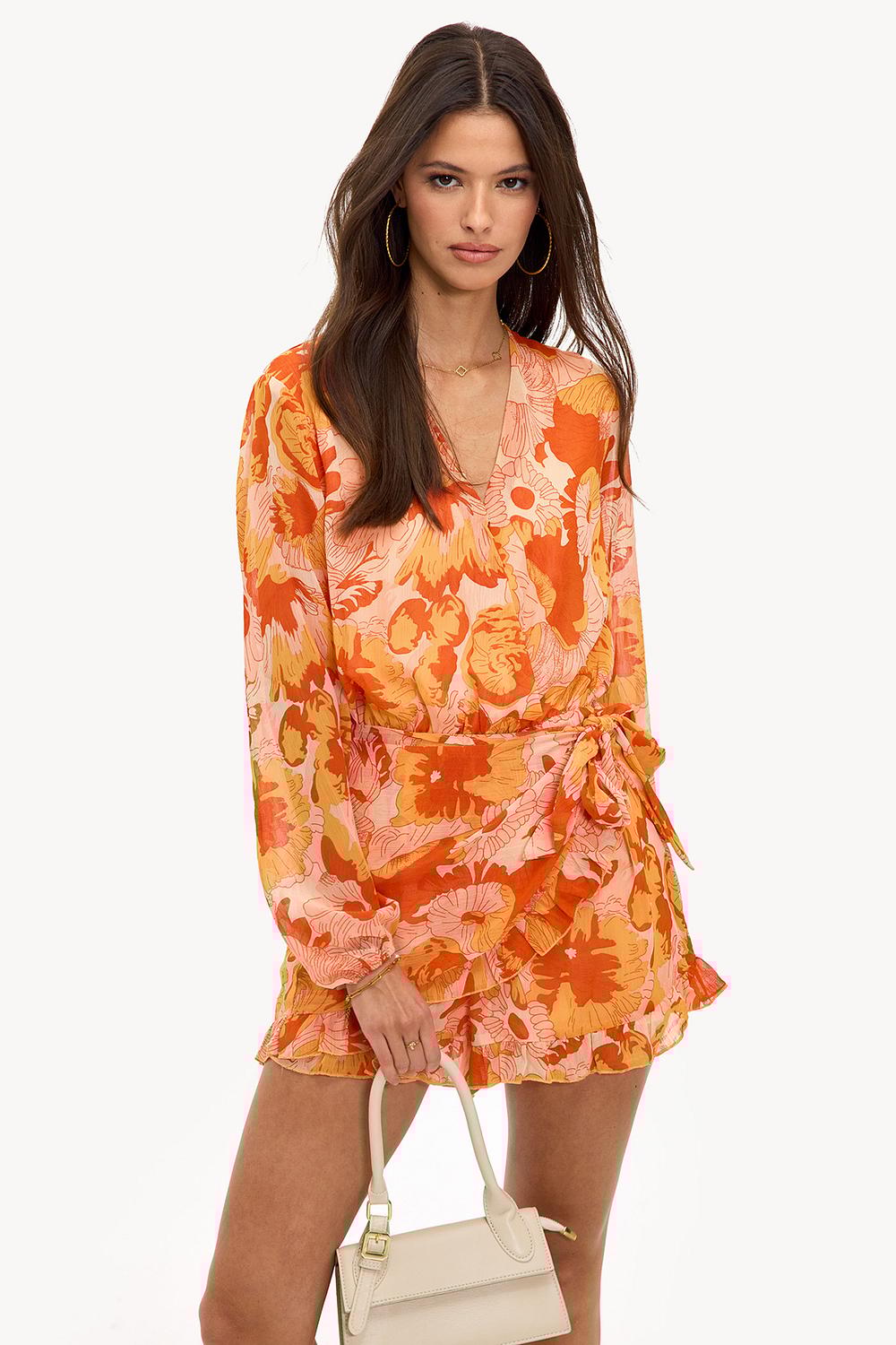 Orange playsuit with floral print