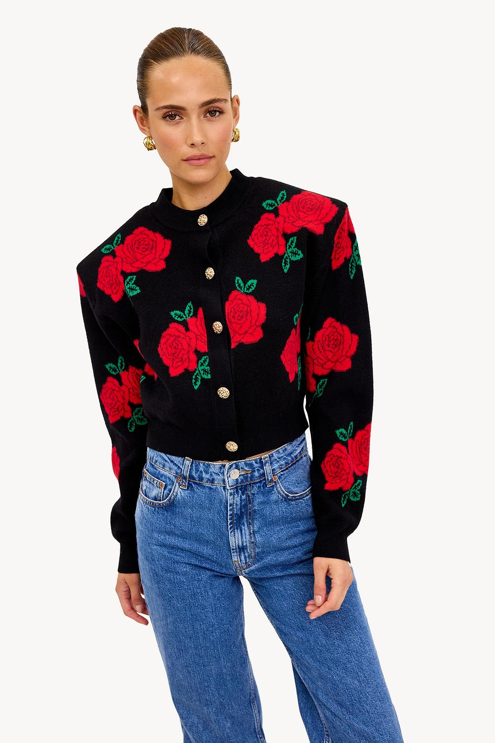 Cardigan noir avec imprimé rose