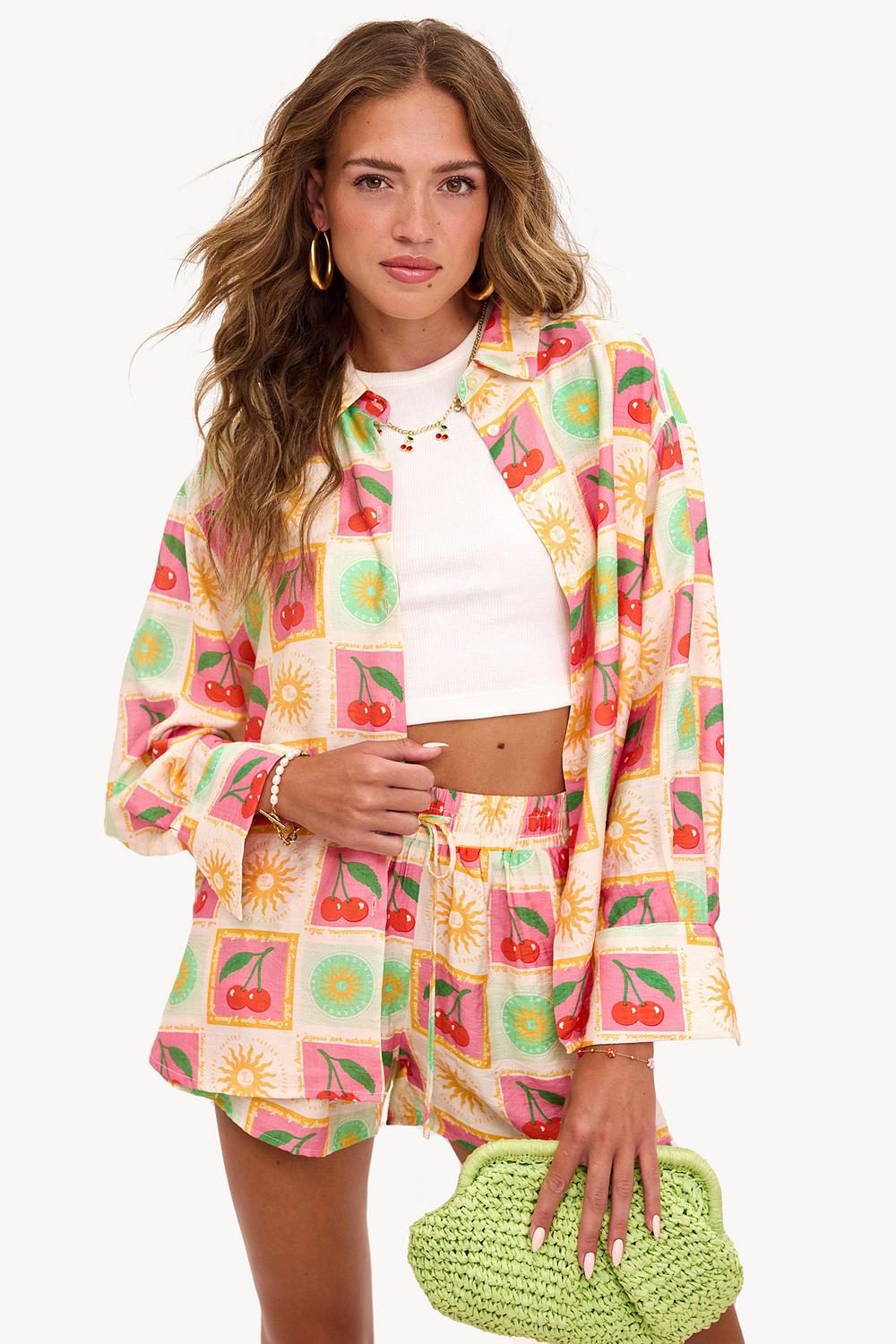 Short rose à imprimé tropical