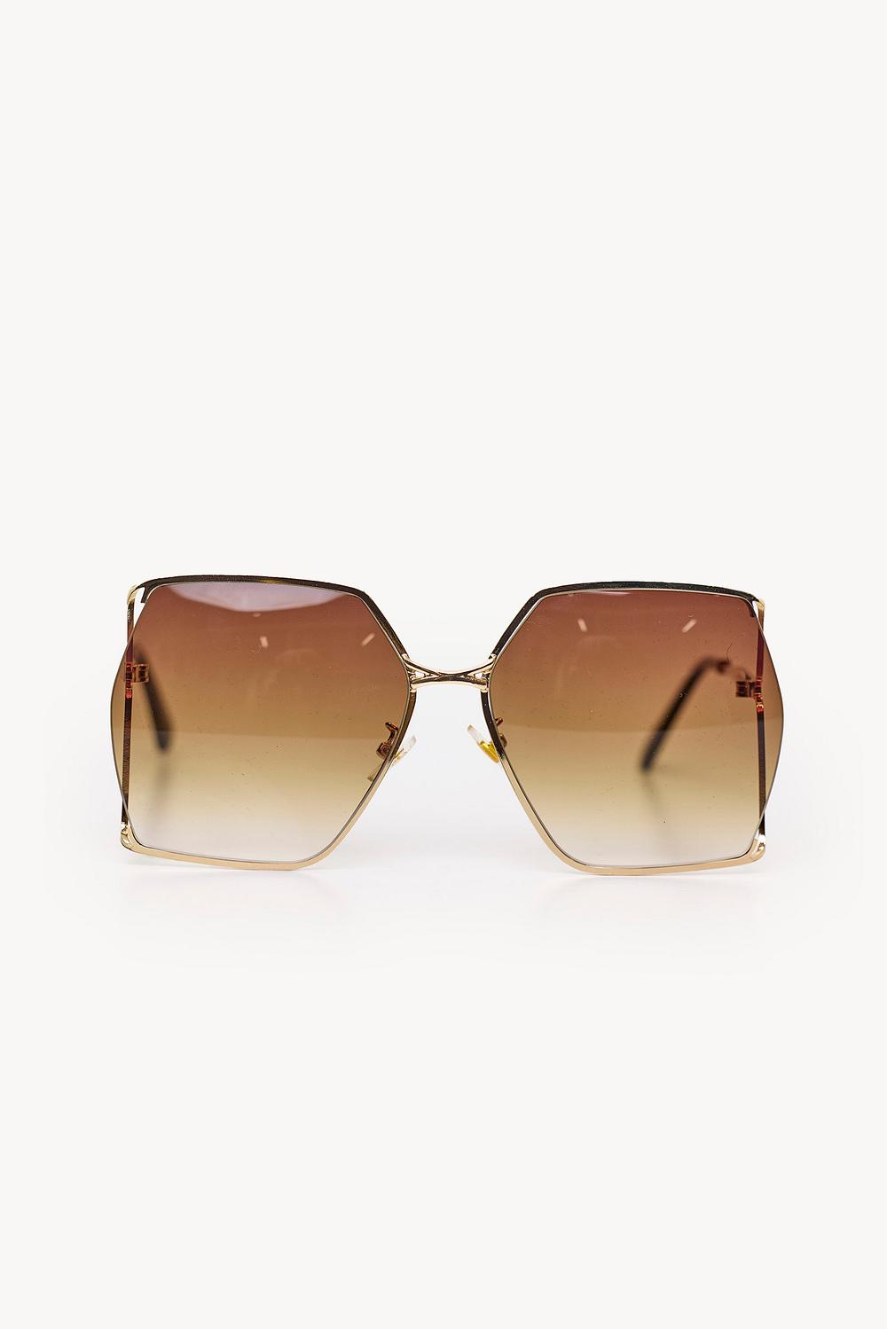 Lunettes de soleil dorées
