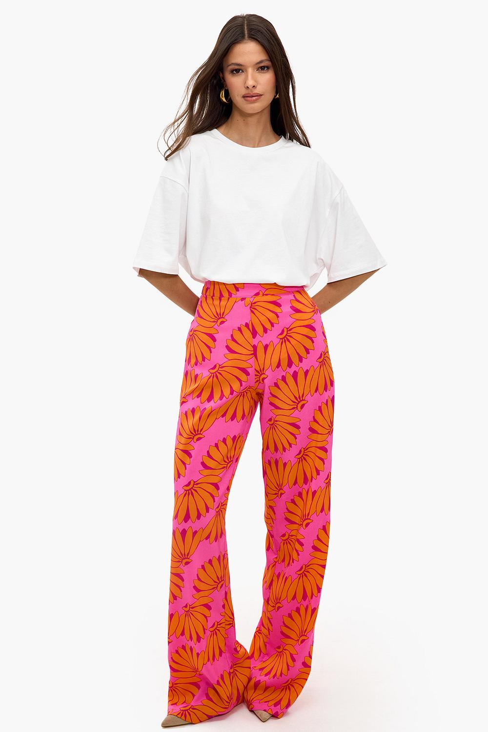 Orange trousers with tropical print