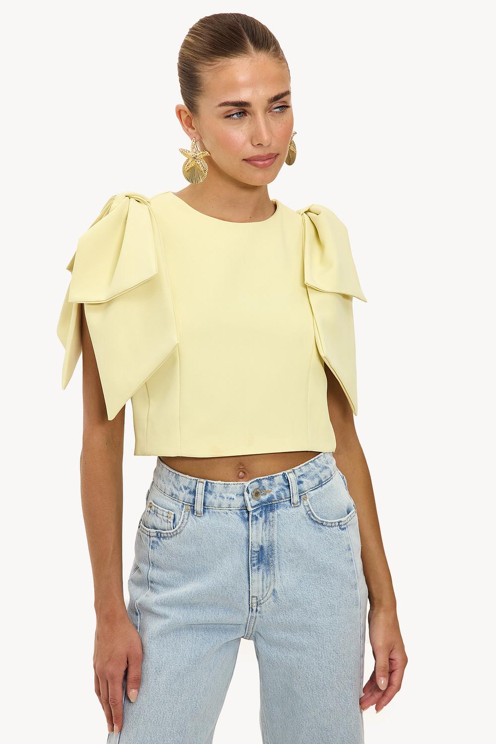 Top jaune clair avec nœuds