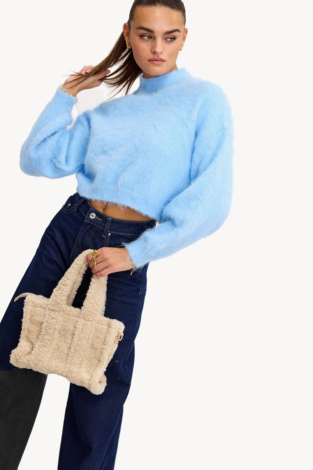 Bolso de peluche beige