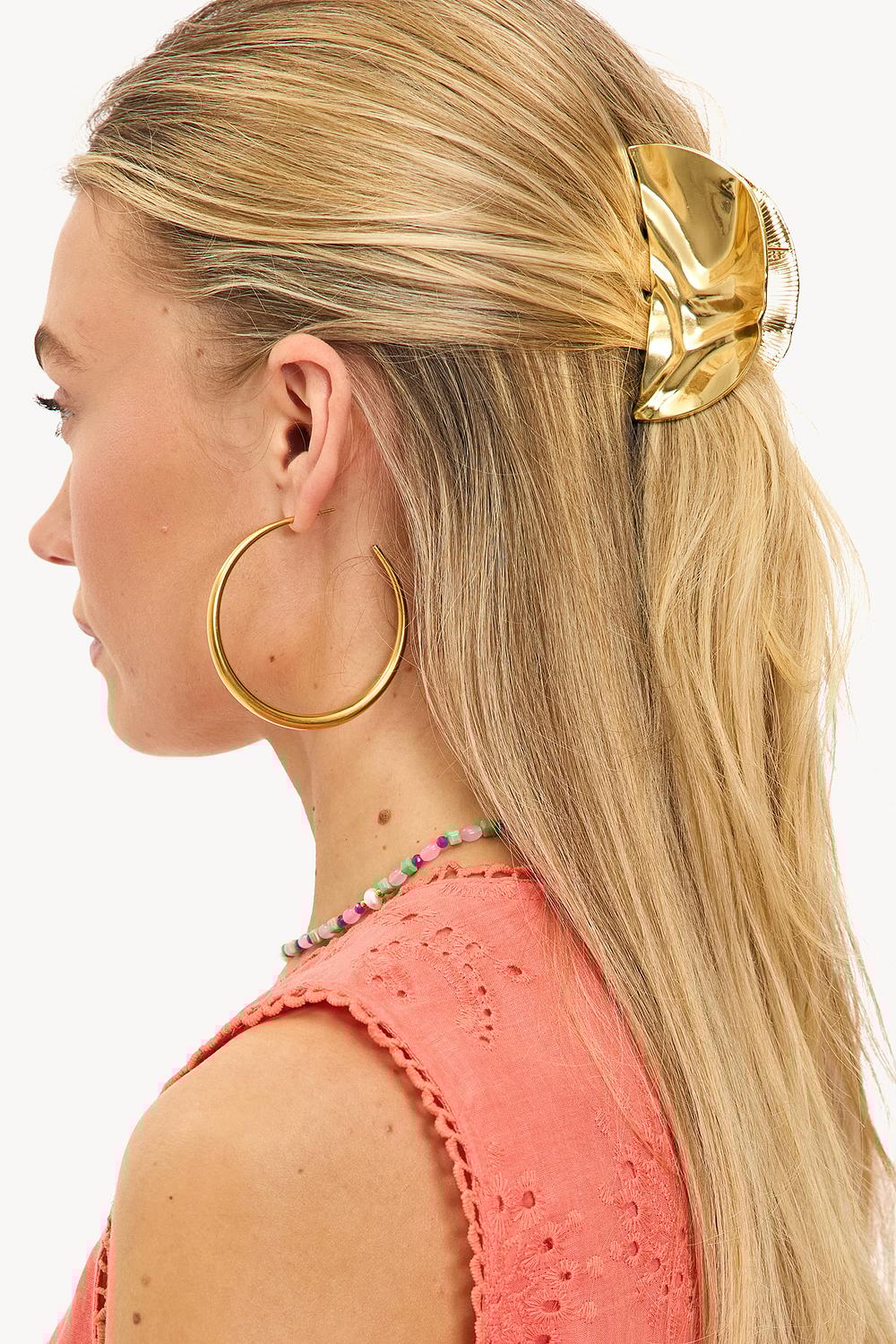 Pince à cheveux dorée