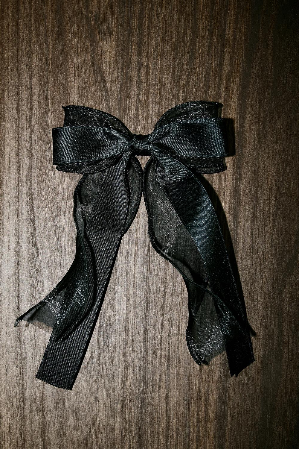 Barrette noire avec nœud