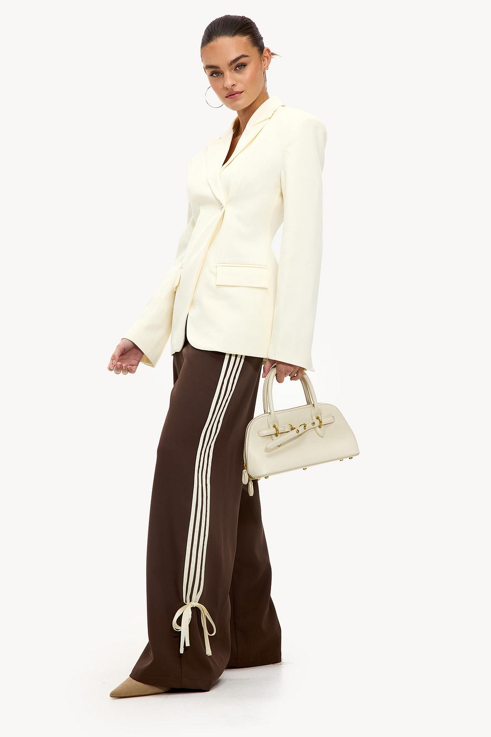 Bruine trackpants met witte strepen