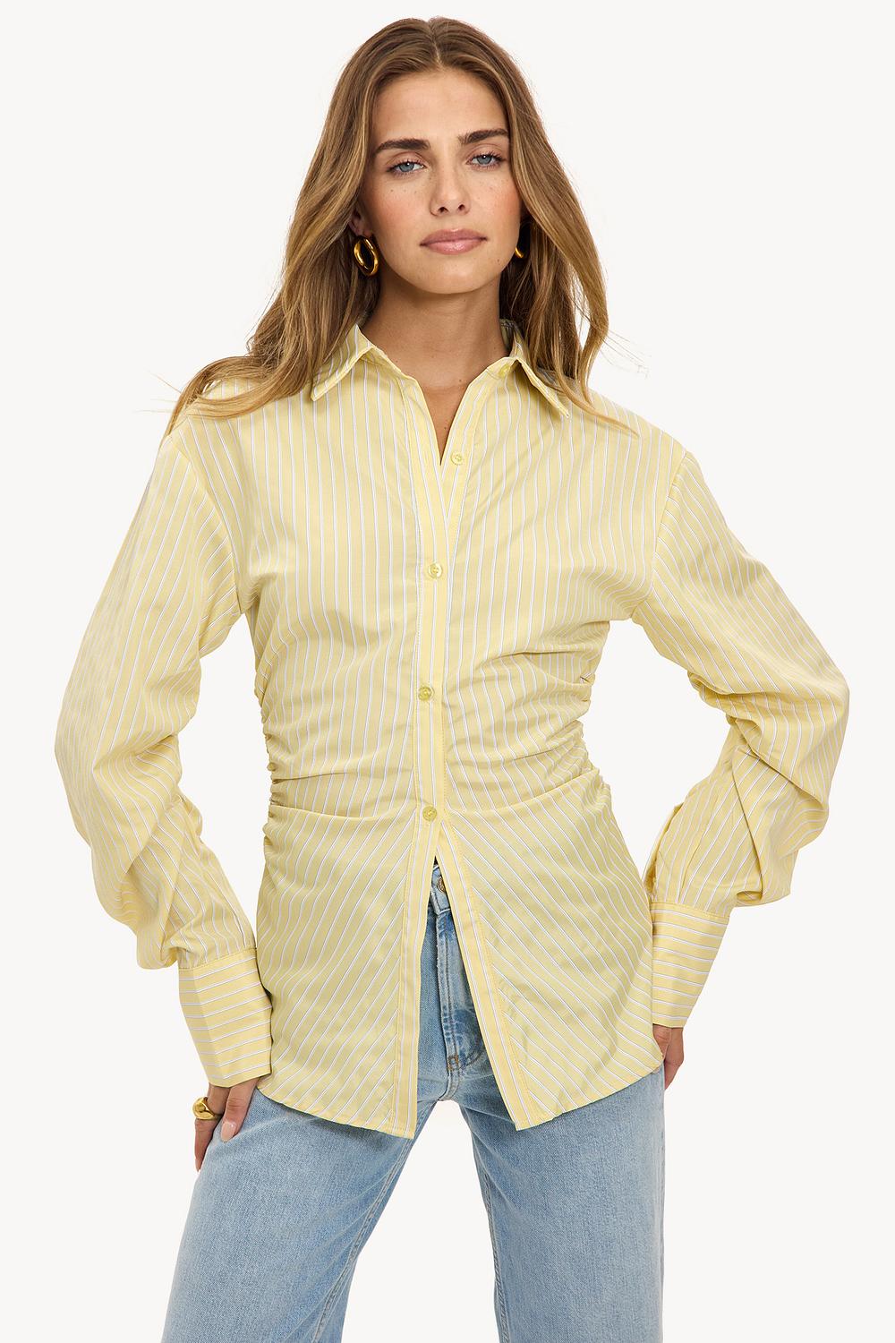 Gele blouse met strepen