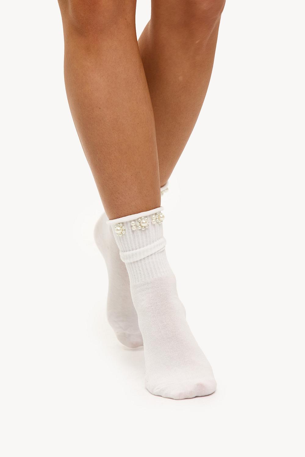 Chaussettes blanches avec perles