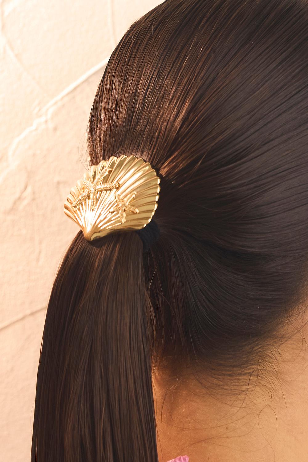 Hair elastic with golden shell