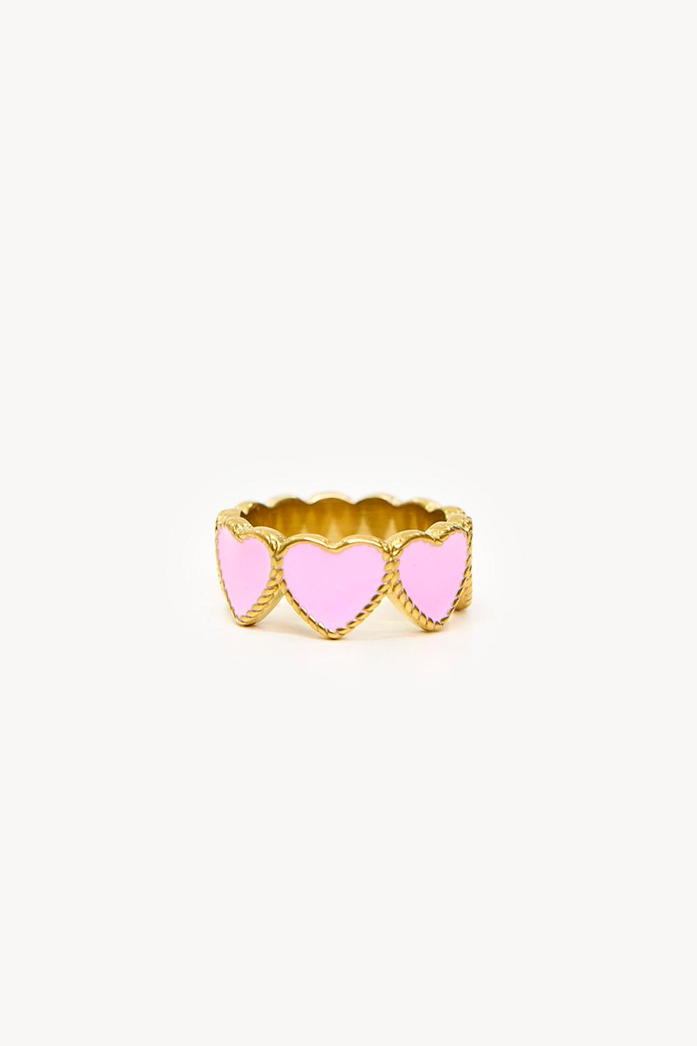 Anillo dorado con corazones rosas