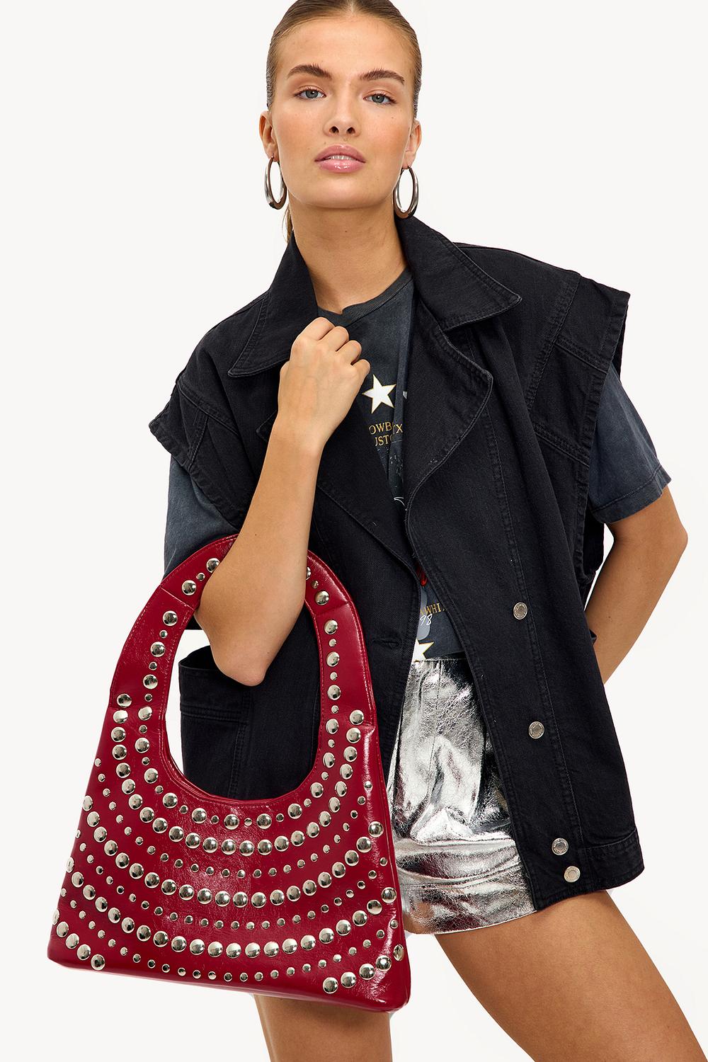 Red handbag with silver studs