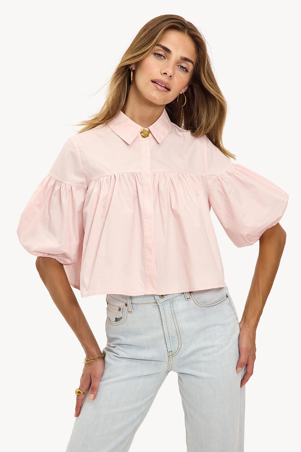 Blusa rosa claro
