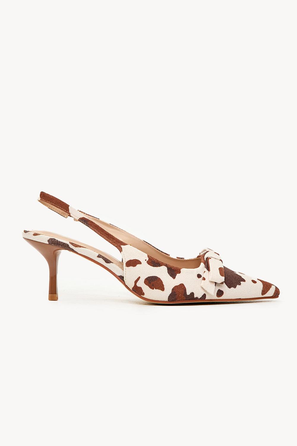 Brown slingbacks with cow print