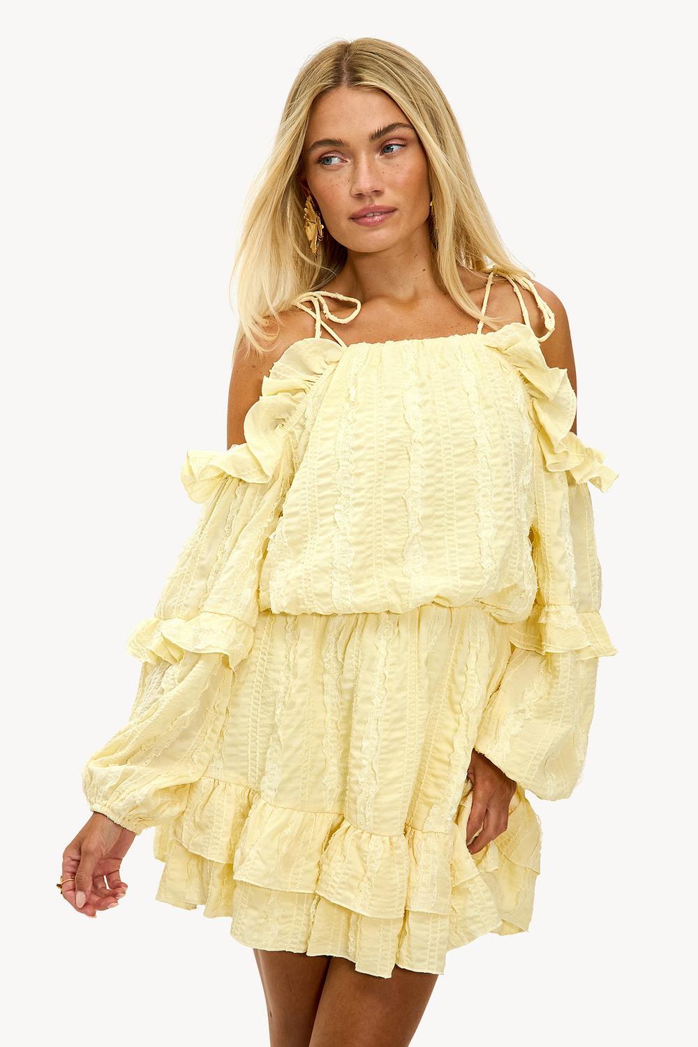 Light yellow dress with ruffles