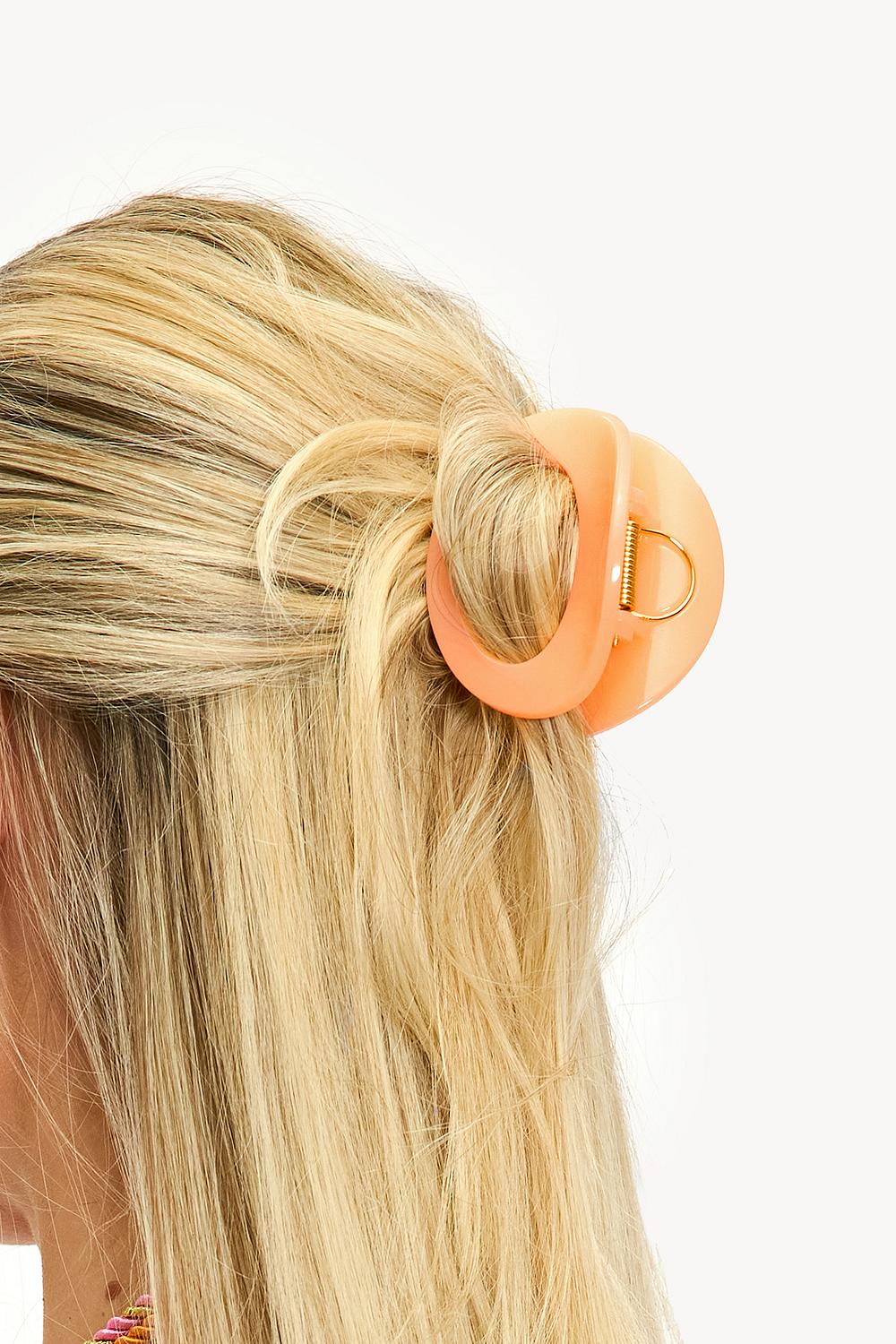 Oranje haarknip