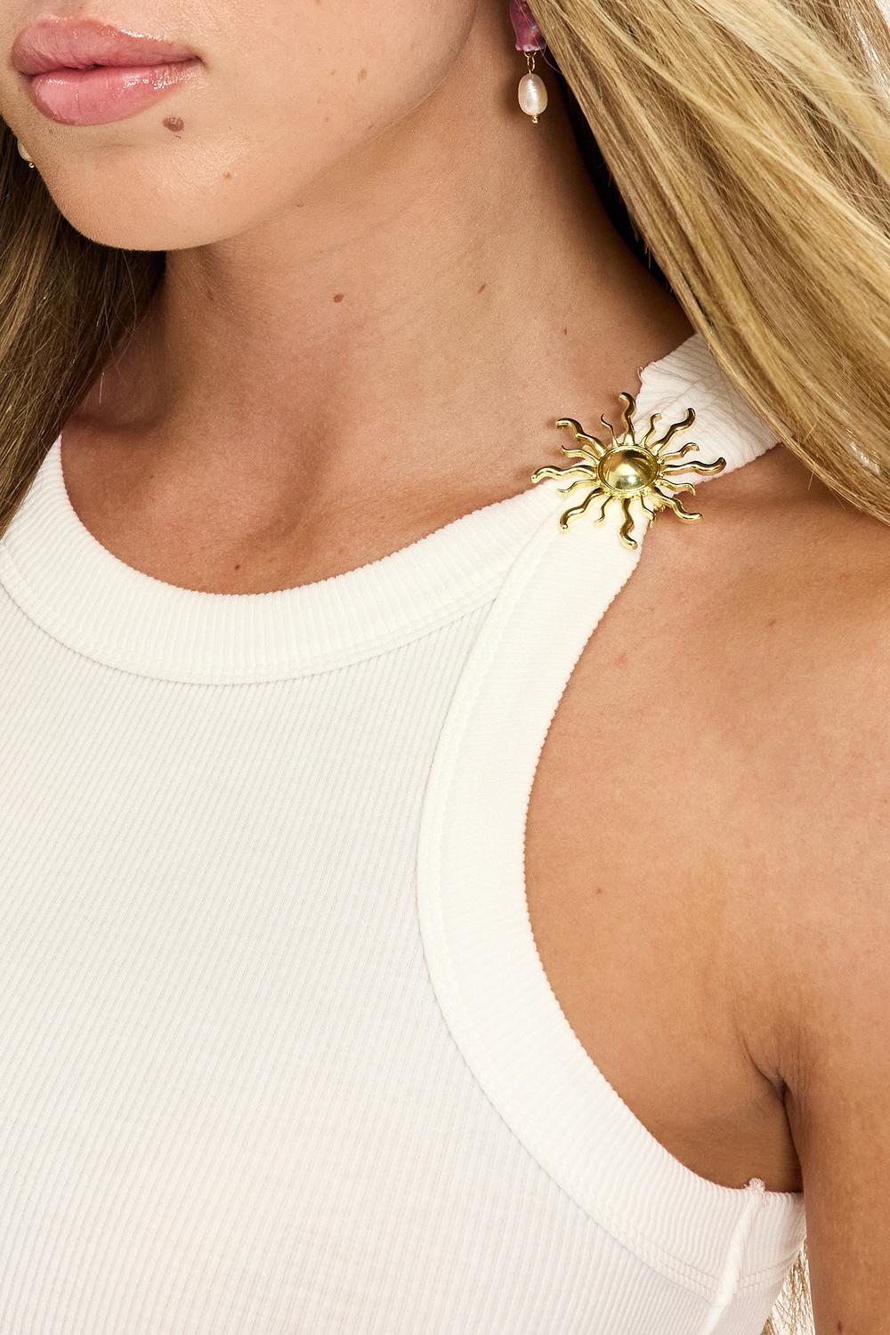 Broche dorée