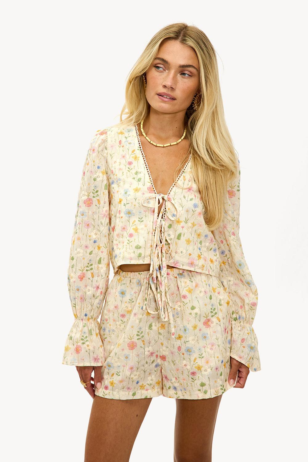 Beige short met bloemen print