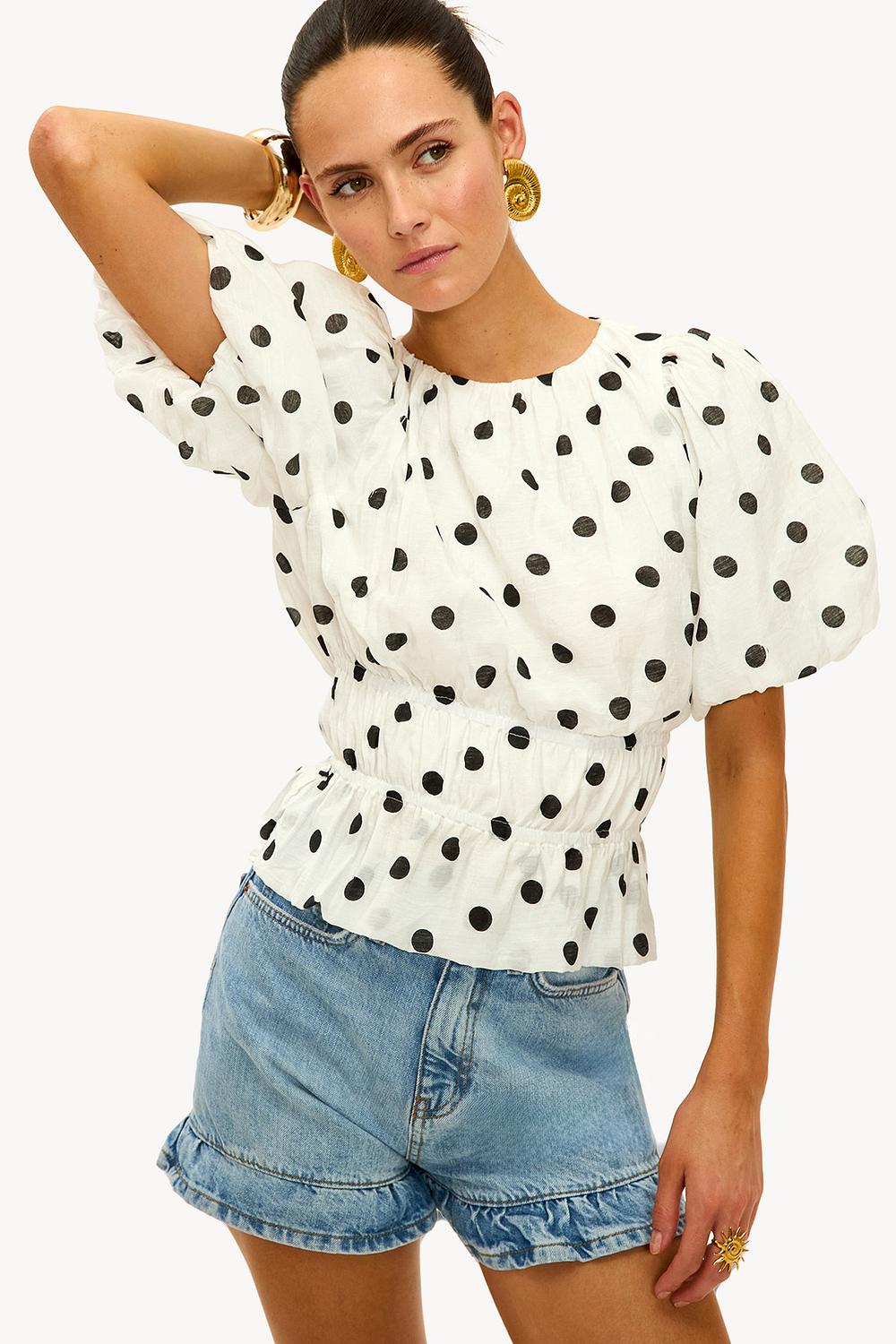White top with polka dots